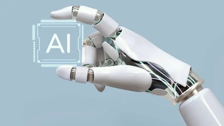 Une main robotisée blanche tient une puce lumineuse marquée « AI », sur fond bleu clair.